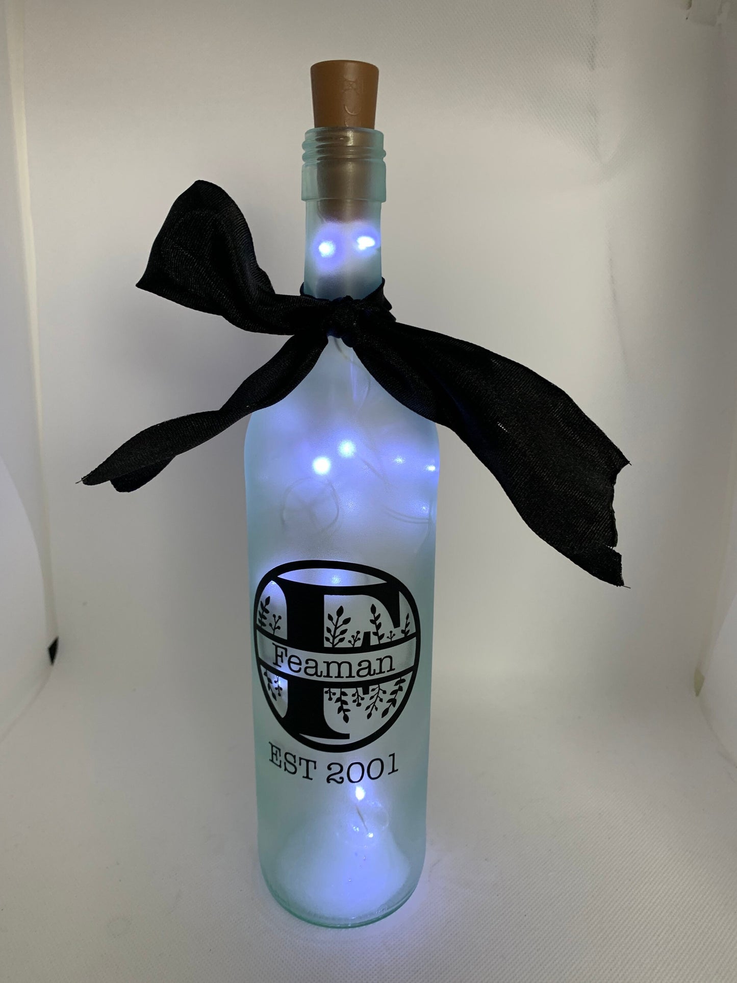 Family name light up wine bottle party decor, keepsake, wedding centerpiece, gift