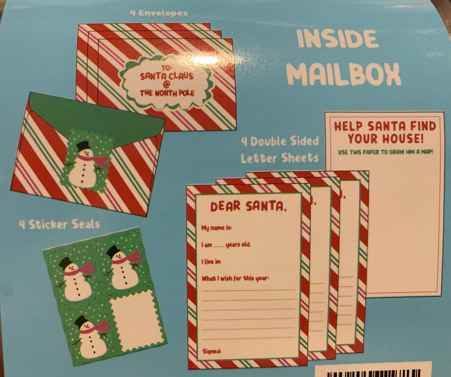 Personalized Christmas North Pole Santa mailbox with letter sheets, envelopes, & stickers.