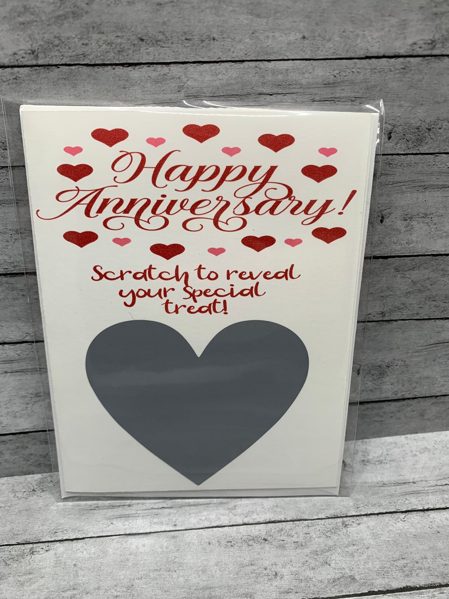 Scratch-off anniversary card. 3 options to select from: massage, breakfast in bed, or blowjob. Or personalize with your own message