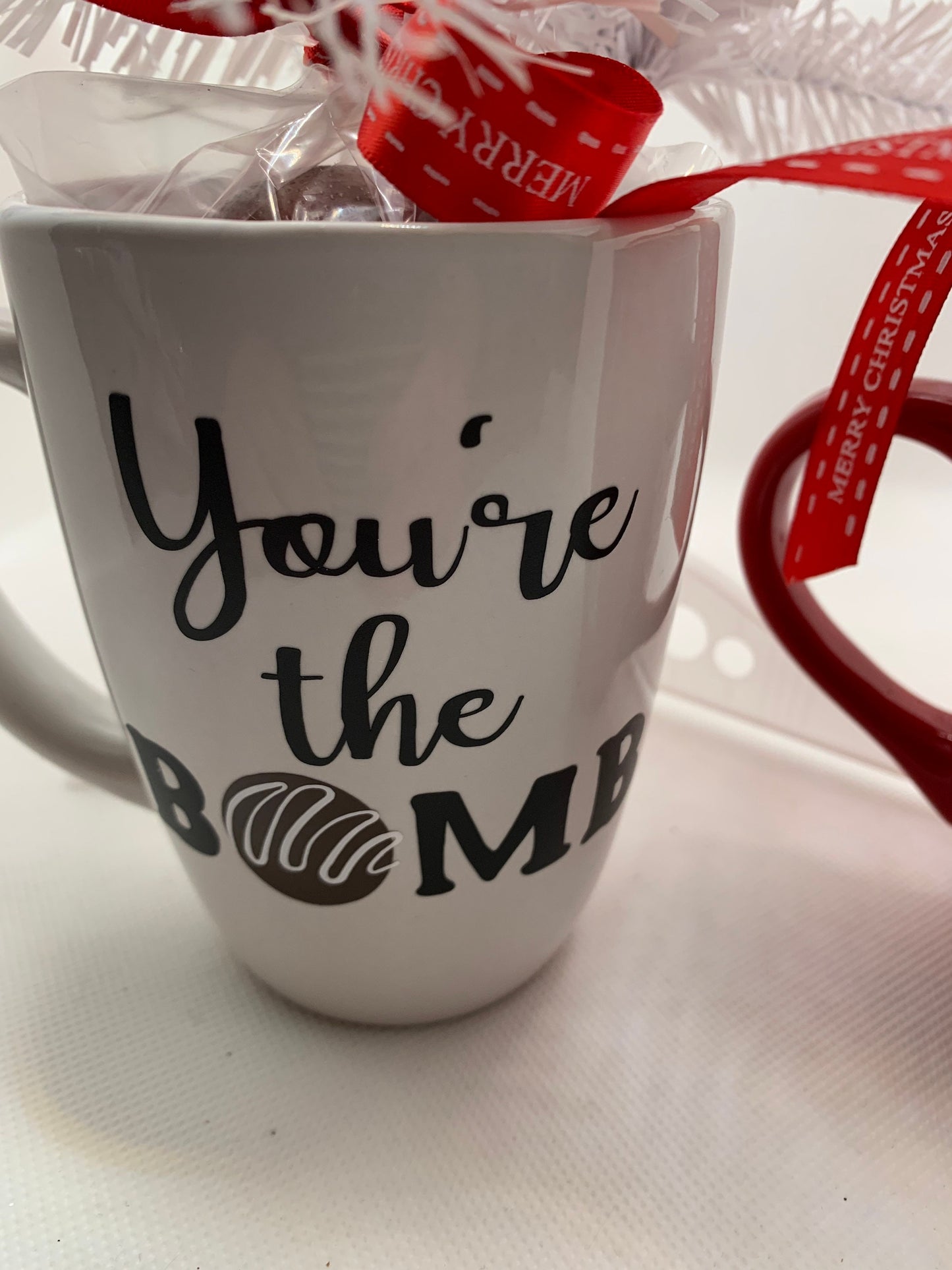 You’re the Bomb mug gift set. Two colors to choose from. Choose from mug only or mug with cocoa bomb- Christmas gift